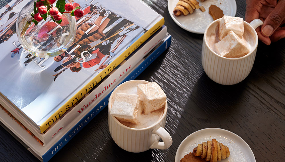 Hot Cocoa with marshmallows and coffee table books