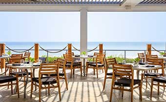 Restaurant outdoor patio overlooking the beach