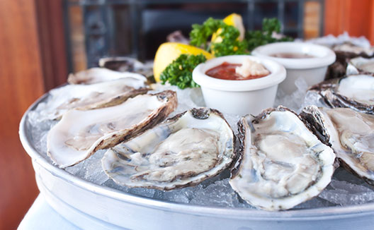 Platter of raw oysters on the half shell